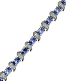 Enhance your look with an element of shine. This stunning sterling silver bracelet showcases oval-cut tanzanite (5-3/4 ct. t.w.) and shimmering diamond accents. Approximate length: 7-1/2 inches. Enhance your look with an element of shine. This stunning sterling silver bracelet showcases oval-cut tanzanite (5-3/4 ct. t.w.) and shimmering diamond accents. Approximate length: 7-1/2 inches.
