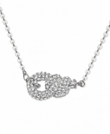 With unique style and grace, Swarovski's Nathalie necklace is sure to make an elegant statement! Necklace features an intricate, knotted design crafted in silver tone mixed metal with sparkling, round-cut crystals. Approximate length: 15 inches. Approximate drop: 1 inch. With unique style and grace, Swarovski's Nathalie necklace is sure to make an elegant statement! Necklace features an intricate, knotted design crafted in silver tone mixed metal with sparkling, round-cut crystals. Approximate length: 15 inches. Approximate drop: 1 inch.