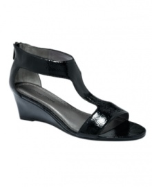Dressed to a T. Sleek, smooth and totally versatile, Adrienne Vittadini's Coby wedge sandals feature a subtle wedge and sultry t-strap that make for timeless style. Dressed to a T. Sleek, smooth and totally versatile, Adrienne Vittadini's Coby wedge sandals feature a subtle wedge and sultry t-strap that make for timeless style.
