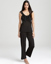 A knit tank top with cascading ruffle detail and matching wide leg pants, a simply chic bedtime look from Oscar de la Renta. A knit tank top with cascading ruffle detail and matching wide leg pants, a simply chic bedtime look from Oscar de la Renta.