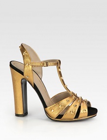 Metallic leather sandal with a hidden platform and goldtone metal studs. Self-covered heel, 4¾ (120mm)Hidden platform, ¾ (20mm)Compares to a 4 heel (100mm)Metallic leather upper with metal studsLeather lining and solePadded insoleMade in Italy Metallic leather sandal with a hidden platform and goldtone metal studs. Self-covered heel, 4¾ (120mm)Hidden platform, ¾ (20mm)Compares to a 4 heel (100mm)Metallic leather upper with metal studsLeather lining and solePadded insoleMade in Italy