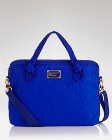 Tote your laptop in style with this chic laptop case from MARC BY MARC JACOBS. Tote your laptop in style with this chic laptop case from MARC BY MARC JACOBS.