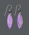 Make a pristine statement in purple. These delicate drop earrings by Jody Coyote feature purple patina brass leaves with an intricate wire charm in sterling silver and purple glass bead accents. Set in sterling silver. Approximate drop: 1-3/4 inches.