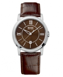 Calming shades of brown give a smooth and handsome look to this Hugo Boss watch. Croc-embossed brown leather strap and round stainless steel case. Brown dial with silvertone stick indices and roman numerals, logo and date window. Quartz movement. Water resistant to 30 meters. Two-year limited warranty. Calming shades of brown give a smooth and handsome look to this Hugo Boss watch. Croc-embossed brown leather strap and round stainless steel case. Brown dial with silvertone stick indices and roman numerals, logo and date window. Quartz movement. Water resistant to 30 meters. Two-year limited warranty.