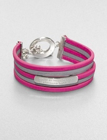 Strips of bright leather alternate in this innovative design, with a bold signature ID tag and toggle close.LeatherRhodium and palladium finishingLength, about7.25Width, about 1.5Toggle closureImported Strips of bright leather alternate in this innovative design, with a bold signature ID tag and toggle close.LeatherRhodium and palladium finishingLength, about7.25Width, about 1.5Toggle closureImported