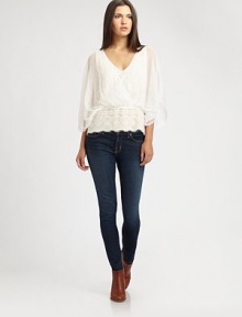 Romantic lace trim and scalloped eyelash edges add feminine charm to this semi-sheer surplice blouse. Semi-sheer surplice topThree-quarter dolman sleevesElastic waistbandScalloped lace-trim hemPolyester lace tank liningShell: PolyesterTrim: 57% cotton/43% nylonDry cleanImportedModel shown is 5'10 (177cm) wearing US size Small. Romantic lace trim and scalloped eyelash edges add feminine charm to this semi-sheer surplice blouse. Semi-sheer surplice topThree-quarter dolman sleevesElastic waistbandScalloped lace-trim hemPolyester lace tank liningShell: PolyesterTrim: 57% cotton/43% nylonDry cleanImportedModel shown is 5'10 (177cm) wearing US size Small.