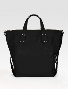 Vibrant leather in a roomy top-handle carryall finished with buckle-strap detail.Double top handles with snaps, 5 dropAdjustable detachable shoulder strap, 18-19¾ dropTop zip closureOne inside zip pocketOne inside open pocketFully lined16¼W X 15¼H X 5¼DImported Vibrant leather in a roomy top-handle carryall finished with buckle-strap detail.Double top handles with snaps, 5 dropAdjustable detachable shoulder strap, 18-19¾ dropTop zip closureOne inside zip pocketOne inside open pocketFully lined16¼W X 15¼H X 5¼DImported