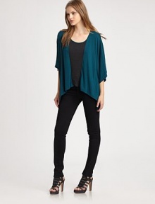 Supple colorblock jersey in an oversized poncho style, slightly flared at the sleeves and hem.ScoopneckDropped shouldersDolman sleevesContour hem67% modal/28% polyester/5% spandexHand washMade in USAModel shown is 5'8½ (174cm) wearing US size Small. Supple colorblock jersey in an oversized poncho style, slightly flared at the sleeves and hem.ScoopneckDropped shouldersDolman sleevesContour hem67% modal/28% polyester/5% spandexHand washMade in USAModel shown is 5'8½ (174cm) wearing US size Small.
