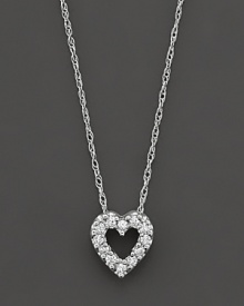 A beautiful diamond heart pendant in 14 Kt. white gold, with rope chain. A beautiful diamond heart pendant in 14 Kt. white gold, with rope chain.