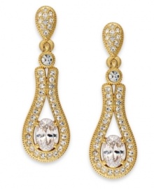 Go for the bold with this pair of linear drop earrings from Eliot Danori. Crafted from 18k gold-plated brass, the earrings astound with crystal and cubic zirconias (3/4 ct. t.w.) adding luster. Approximate drop: 1 inch. Go for the bold with this pair of linear drop earrings from Eliot Danori. Crafted from 18k gold-plated brass, the earrings astound with crystal and cubic zirconias (3/4 ct. t.w.) adding luster. Approximate drop: 1 inch.