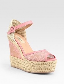 A rope-edged platform heightens this luxe silhouette of semi-sheer lace with leather trim, backed by soft woven fabric. Covered wedge, 5 (125mm)Covered platform, 1¾ (45mm)Compares to a 3¼ heel (80mm)Lace and woven fabric upper with leather trimAdjustable leather ankle strapLeather liningRubber solePadded insoleMade in Italy A rope-edged platform heightens this luxe silhouette of semi-sheer lace with leather trim, backed by soft woven fabric. Covered wedge, 5 (125mm)Covered platform, 1¾ (45mm)Compares to a 3¼ heel (80mm)Lace and woven fabric upper with leather trimAdjustable leather ankle strapLeather liningRubber solePadded insoleMade in Italy