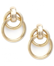 Knock on fashion's door with these twisted hoop earrings from Jones New York. Crafted in gold tone mixed metal. Approximate drop: 1 inch. Knock on fashion's door with these twisted hoop earrings from Jones New York. Crafted in gold tone mixed metal. Approximate drop: 1 inch.