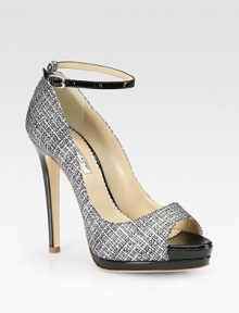 Stunning patent leather in a unique tweed print with a covered platform and skinny heel. Self-covered heel, 4½ (115mm)Covered platform, 1 (25mm)Compares to a 3½ heel (90mm)Patent leather upperLeather lining and solePadded insoleMade in ItalyOUR FIT MODEL RECOMMENDS ordering true whole size; ½ sizes should order the next whole size up. Stunning patent leather in a unique tweed print with a covered platform and skinny heel. Self-covered heel, 4½ (115mm)Covered platform, 1 (25mm)Compares to a 3½ heel (90mm)Patent leather upperLeather lining and solePadded insoleMade in ItalyOUR FIT MODEL RECOMMENDS ordering true whole size; ½ sizes should order the next whole size up.