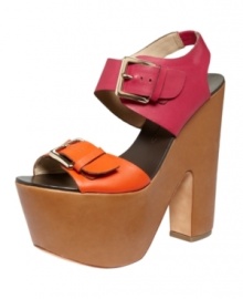 Bold is in. From tangy color blocking to a towering notched platform wedge heel, the Bruner sandals by Report Signature are strictly for those who dare. Bold is in. From tangy color blocking to a towering notched platform wedge heel, the Bruner sandals by Report Signature are strictly for those who dare.