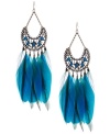 Fashion takes flight on Haskell's trendy feather chandelier earrings. Bold blue-hued feathers add breezy demure to an intricate blue acrylic beaded chandelier setting. Crafted in brass-plated mixed metal on fishwire. Approximate drop: 6-1/2 inches.