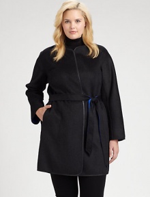 In this coat, you will surely receive compliments, thanks to its buttery leather trim. This impeccable design also features a waist-defining, reversible belt and contrast lining offering brilliant color pops.Feminine necklineSelf-tie beltSlash pocketsLeather trimAbout 36 from shoulder to hemWool/angoraDry clean by leather specialistImported In this coat, you will surely receive compliments, thanks to its buttery leather trim. This impeccable design also features a waist-defining, reversible belt and contrast lining offering brilliant color pops.Feminine necklineSelf-tie beltSlash pocketsLeather trimAbout 36 from shoulder to hemWool/angoraDry clean by leather specialistImported