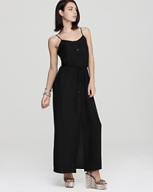 A sweeping Aqua maxi dress features buttons through the front for a unique detail to the must-have staple. A sweeping Aqua maxi dress features buttons through the front for a unique detail to the must-have staple.