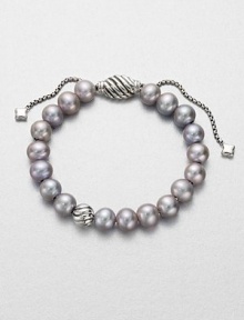 From the Spiritual Bead Collection. Luminous grey freshwater pearls on a sterling silver box chain with sterling silver cabled bead accents. 8mm grey freshwater pearlsSterling silverDiameter, about 7.75 adjustableBead closureImported From the Spiritual Bead Collection. Luminous grey freshwater pearls on a sterling silver box chain with sterling silver cabled bead accents. 8mm grey freshwater pearlsSterling silverDiameter, about 7.75 adjustableBead closureImported
