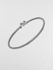 From the Cable Collectible Collection. This sweet style features a pretty butterfly with an 18k gold thorax on an iconic cable bangle. Sterling silver18k goldDiameter, about 2½Slip-on styleImported From the Cable Collectible Collection. This sweet style features a pretty butterfly with an 18k gold thorax on an iconic cable bangle. Sterling silver18k goldDiameter, about 2½Slip-on styleImported