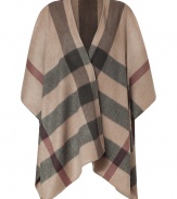 An ultra luxe alternative to outerwear, Burberry Londons giant check cape lends an elegant, iconic polish to every outfit - Wrapped front, longer drape at sides - Wear over slim fit separates with turtlenecks and sleek ankle boots