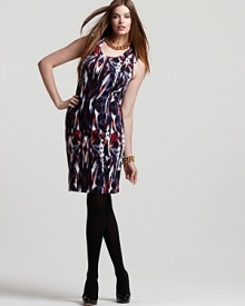 A painterly ikat print puts a global spin on this Calvin Klein sheath, rendered in a substantial ponte knit. Play to the exotic sensibility with an armful of bold wooden bangles. A painterly ikat print puts a global spin on this Calvin Klein sheath, rendered in a substantial ponte knit. Play to the exotic sensibility with an armful of bold wooden bangles.