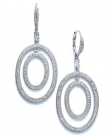 Other-worldly elegance. Eliot Danori's orbital drop earrings exude style and grace with the addition of sparkling crystal accents. Set in rhodium-plated mixed metal. Approximate drop: 2 inches. Other-worldly elegance. Eliot Danori's orbital drop earrings exude style and grace with the addition of sparkling crystal accents. Set in rhodium-plated mixed metal. Approximate drop: 2 inches.
