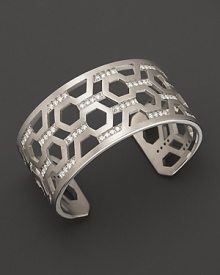 Brilliant diamonds pop against gleaming sterling silver in India Hicks' intriguing, geometric cuff. Brilliant diamonds pop against gleaming sterling silver in India Hicks' intriguing, geometric cuff.