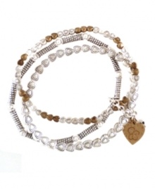 Simple, yet sweet. This bangle set features a heart charm with the Jessica Simpson logo and a chic beaded design. Crafted in in worn gold and silver tone mixed metal to match your other accessories. Bracelets stretch to fit your wrist. Approximate diameter: 2-1/4 inches. Simple, yet sweet. This bangle set features a heart charm with the Jessica Simpson logo and a chic beaded design. Crafted in in worn gold and silver tone mixed metal to match your other accessories. Bracelets stretch to fit your wrist. Approximate diameter: 2-1/4 inches.