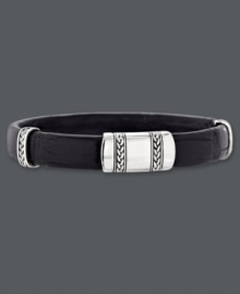 Rugged sophistication. Genuine black crocodile skin combines with braided sterling silver to create the ultimate men's accessory. Approximate length: 8-1/2 inches. Approximate width: 3/8 inch. Rugged sophistication. Genuine black crocodile skin combines with braided sterling silver to create the ultimate men's accessory. Approximate length: 8-1/2 inches. Approximate width: 3/8 inch.