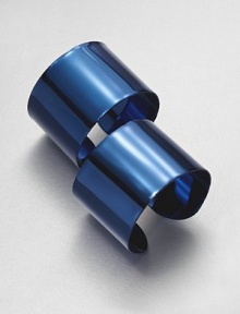Finished in a deep shade of blue, these strikingly simple, flexible open cuffs can be worn around the upper arm for drama or at the wrist for elegance.BrassPlasticDiameter, about 3Width, about 3.5Made in Italy Finished in a deep shade of blue, these strikingly simple, flexible open cuffs can be worn around the upper arm for drama or at the wrist for elegance.BrassPlasticDiameter, about 3Width, about 3.5Made in Italy