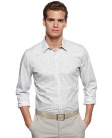 Classic style with a modern twist. This woven shirt from Calvin Klein comes in a slim fit for your up-to-date look. Classic style with a modern twist. This woven shirt from Calvin Klein comes in a slim fit for your up-to-date look.