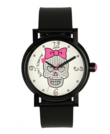 Betsey Johnson can make even the dark side look darling. Watch crafted of black polyurethane strap and round black polycarbonate case. White dial features large graphic of a crystal-accented skull with pink bow, silver tone numerals at twelve, three, six and nine o'clock, dot markers, black hour and minute hands, signature fuchsia second hand and logo. Quartz movement. Water resistant to 30 meters. Two-year limited warranty. Betsey Johnson can make even the dark side look darling. Watch crafted of black polyurethane strap and round black polycarbonate case. White dial features large graphic of a crystal-accented skull with pink bow, silver tone numerals at twelve, three, six and nine o'clock, dot markers, black hour and minute hands, signature fuchsia second hand and logo. Quartz movement. Water resistant to 30 meters. Two-year limited warranty.