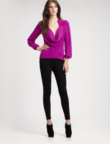 Vivacious silk with a plunging cowlneck and long puffer sleeves. CowlneckLong puffer sleevesSilkDry cleanImportedModel shown is 5'10½ (179cm) wearing US size 4. Vivacious silk with a plunging cowlneck and long puffer sleeves. CowlneckLong puffer sleevesSilkDry cleanImportedModel shown is 5'10½ (179cm) wearing US size 4.