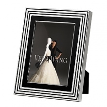 This new collection from bridal favorite Vera Wang updates the designer's popular With Love collection in striking black enamel and silver. Featuring a geometric design, it is at once Art Deco-inspired and thoroughly modern. This new collection from bridal favorite Vera Wang updates the designer's popular With Love collection in striking black enamel and silver. Featuring a geometric design, it is at once Art Deco-inspired and thoroughly modern.