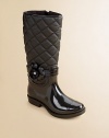 Chase away her rainy day blues in these quilted rubber rainboots with plastic flower and stone decoration.Pull-on styleQuilted nylon and fabric upperFaux leather liningRubber solePadded insoleImported