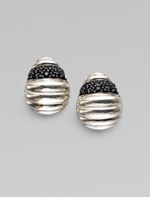 A ridged, oval sterling silver design with a sparkling black sapphire stripe. Black sapphiresSterling silverSize, about ¾Omega post backImported 