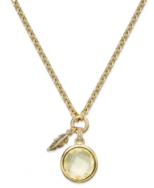 Tickle your fashion sense with this Juicy Couture charm necklace. A circular glass stone in alluring hues is paired with a feather charm for a sweet finishing touch. Crafted in gold tone mixed metal. Approximate length: 16 inches. Approximate drop: 1-1/2 inches. Tickle your fashion sense with this Juicy Couture charm necklace. A circular glass stone in alluring hues is paired with a feather charm for a sweet finishing touch. Crafted in gold tone mixed metal. Approximate length: 16 inches. Approximate drop: 1-1/2 inches.