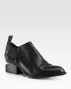 A metal cutout heel modernizes this sleek leather ankle boot with elastic panels for easy on and off access. Stacked heel with metal cutout, 1½ (40mm)Leather upper with elastic panelsPull-on styleLeather lining and solePadded insoleImported