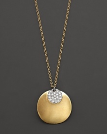 This gold concave dip medallion necklace is paired with a diamond pavé medallion. Designed by Meira T. This gold concave dip medallion necklace is paired with a diamond pavé medallion. Designed by Meira T.