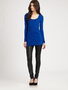 Textured crinkle effect and lengthy silhouette invigorate this supremely soft jersey top. ScoopneckLong sleevesAbout 29 from shoulder to hem94% rayon/6% spandexDry cleanMade in USAModel shown is 5'9½ (176cm) wearing US size Small. Textured crinkle effect and lengthy silhouette invigorate this supremely soft jersey top. ScoopneckLong sleevesAbout 29 from shoulder to hem94% rayon/6% spandexDry cleanMade in USAModel shown is 5'9½ (176cm) wearing US size Small.