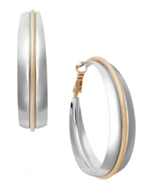 Get in on the two tone trend! Alfani's stylish hoop earrings combine a silver-plated mixed metal setting with a gold-plated accent stripe. Approximate diameter: 2-1/8 inches. Get in on the two tone trend! Alfani's stylish hoop earrings combine a silver-plated mixed metal setting with a gold-plated accent stripe. Approximate diameter: 2-1/8 inches.