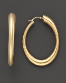 Oval hoops in matte 14K gold with a satin finish. Oval hoops in matte 14K gold with a satin finish.