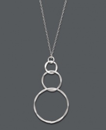 Light and airy, this subtle style perfects any look. Studio Silver's pretty pendant features three graduated, interlocking rings in sterling silver. Approximate length: 16 inches. Approximate drop: 1-3/4 inches. Light and airy, this subtle style perfects any look. Studio Silver's pretty pendant features three graduated, interlocking rings in sterling silver. Approximate length: 16 inches. Approximate drop: 1-3/4 inches.