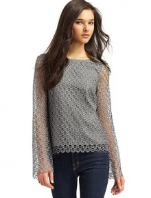 THE LOOKLong bell sleevesV backPatterned lace detail throughoutTHE FITAbout 23 from shoulder to hemTHE MATERIALPolyesterLined at front and backCARE & ORIGINDry cleanImportedModel shown is 5'10 (177cm) wearing US size Small. THE LOOKLong bell sleevesV backPatterned lace detail throughoutTHE FITAbout 23 from shoulder to hemTHE MATERIALPolyesterLined at front and backCARE & ORIGINDry cleanImportedModel shown is 5'10 (177cm) wearing US size Small.