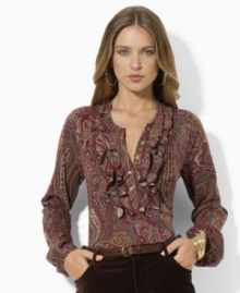 A sweeping paisley pattern enlivens Lauren Jeans Co.'s soft cotton top, crated with elegant pintucking and ruffles at the neckline for feminine appeal. A sweeping paisley pattern enlivens Lauren Jeans Co.'s soft cotton top, crated with elegant pintucking and ruffles at the neckline for feminine appeal.