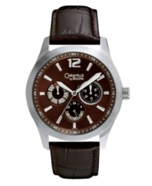 A sharp dress watch in rich, saturated browns. By Caravelle by Bulova. Brown croc-embossed leather strap and round silver tone mixed metal case. Brown dial features silver tone numeral at twelve o'clock, stick indices, three multifunctional subdials, three hands and logo. Quartz movement. Water resistant to 30 meters. Two-year limited warranty. A sharp dress watch in rich, saturated browns. By Caravelle by Bulova. Brown croc-embossed leather strap and round silver tone mixed metal case. Brown dial features silver tone numeral at twelve o'clock, stick indices, three multifunctional subdials, three hands and logo. Quartz movement. Water resistant to 30 meters. Two-year limited warranty.