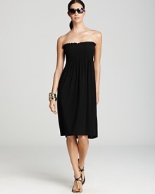 Perfect effortless sun style with this pull-on tube dress from Magicsuit. This easy-to-wear piece features smocking at the chest for silhouette enhancing glamour. Perfect effortless sun style with this pull-on tube dress from Magicsuit. This easy-to-wear piece features smocking at the chest for silhouette enhancing glamour.