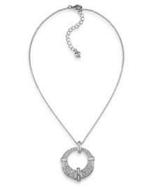 Elegance comes full circle. Carolee's glitzy circle pendant is decorated with glass crystals set in imitation rhodium-plated mixed metal. Approximate length: 16 inches +2-inch extender. Approximate drop: 1-1/4 inches. Elegance comes full circle. Carolee's glitzy circle pendant is decorated with glass crystals set in imitation rhodium-plated mixed metal. Approximate length: 16 inches +2-inch extender. Approximate drop: 1-1/4 inches.