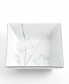 Wildflowers sparkle as they grow on the glazed white porcelain of Charter Club's Platinum Silhouette Square dinnerware. The dishes have a banded edge that adds a classic touch to a vegetable bowl with modern spirit.