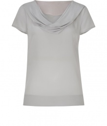 Stylish top in fine, pure light grey silk - Luxe fabric is soft to the touch and drapes beautifully - Slim, straight silhouette, hits just below hip - Short sleeves and small, side slit detail - Fabric darts at bust and back, wide hem - Beautifully proportioned, oversize cowl neck - Elegant, light rose lining at collar - Pair with a pencil skirt or wide-leg trousers and platform pumps Stylish top in fine, pure light grey silk - Luxe fabric is soft to the touch and drapes beautifully - Slim, straight silhouette, hits just below hip - Short sleeves and small, side slit detail - Fabric darts at bust and back, wide hem - Beautifully proportioned, oversize cowl neck - Elegant, light rose lining at collar - Pair with a pencil skirt or wide-leg trousers and platform pumps